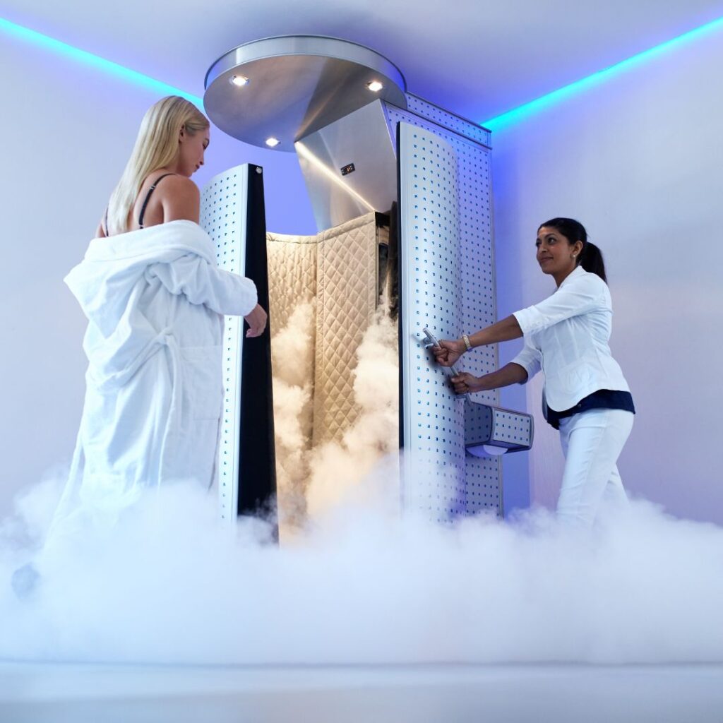 woman stepping into cryo chamber
