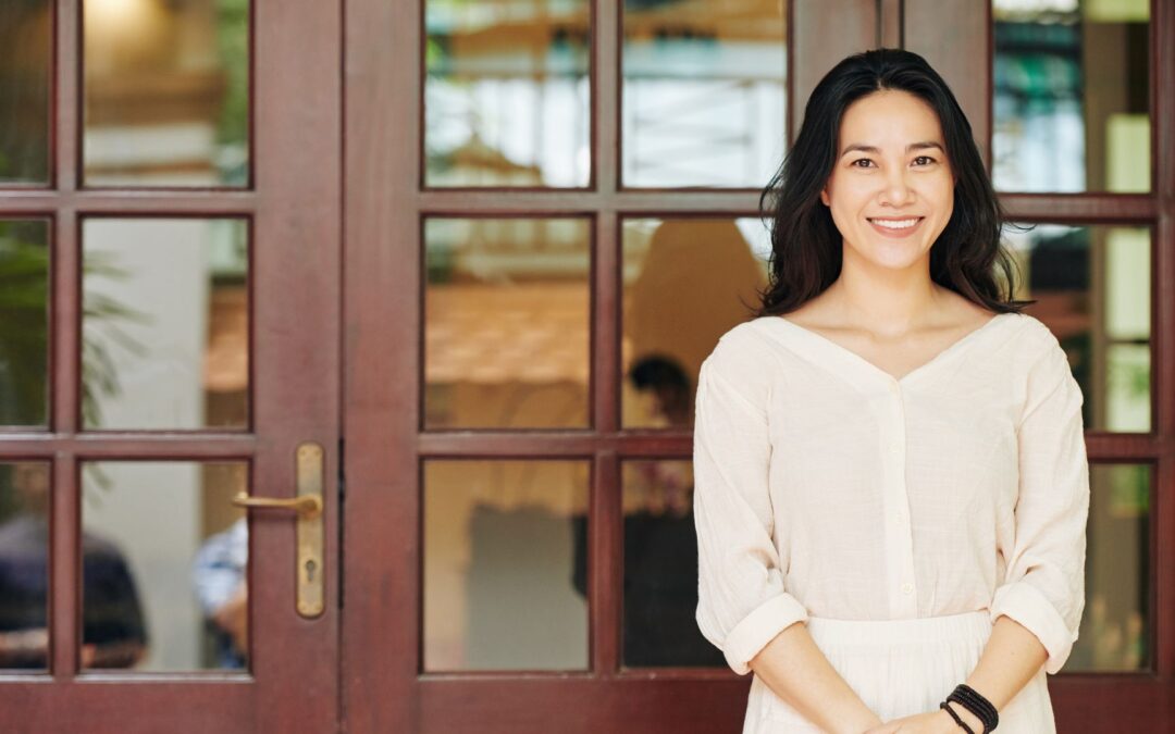 woman in front of her wellness facility
