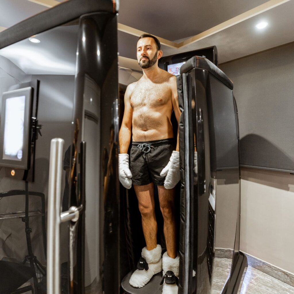man in a cryotherapy chamber